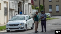 La policía custodia el Tribunal Municipal de Marianao, en La Habana, donde fueron encausados varios de los manifestantes del 11J. (Yamil Lage/AFP/Archivo)